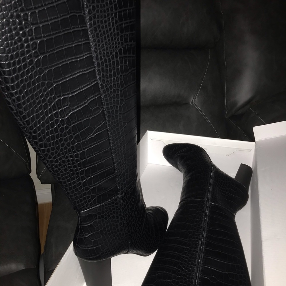 Knee high black boots